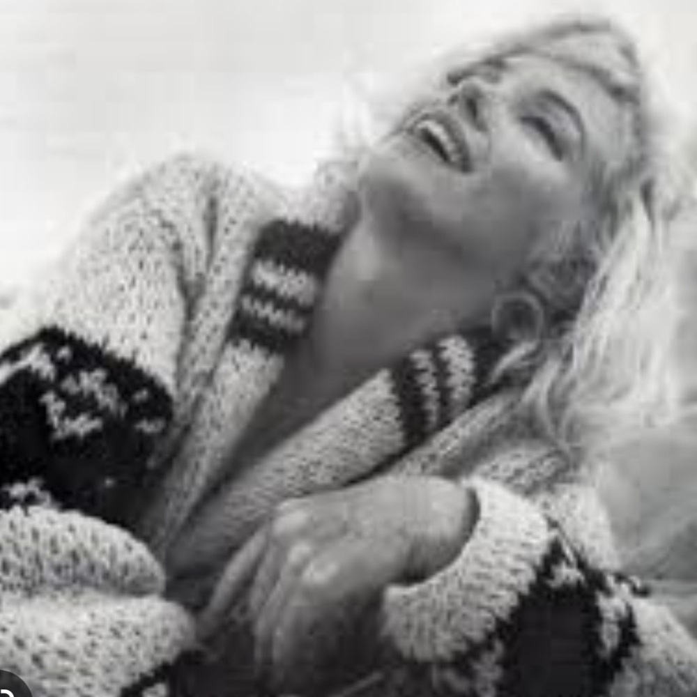 SWEATERS